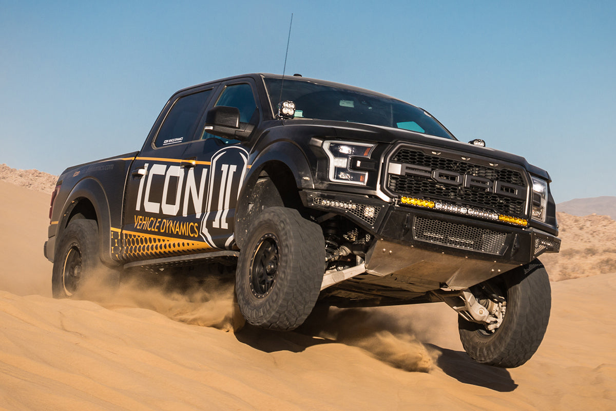 Ford Raptor on ICON Vehicle Dynamics suspension system driving off-road